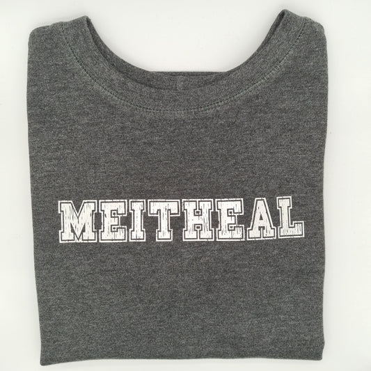 Folded grey sweatshirt with "MEITHEAL", in a varsity font, printed on it