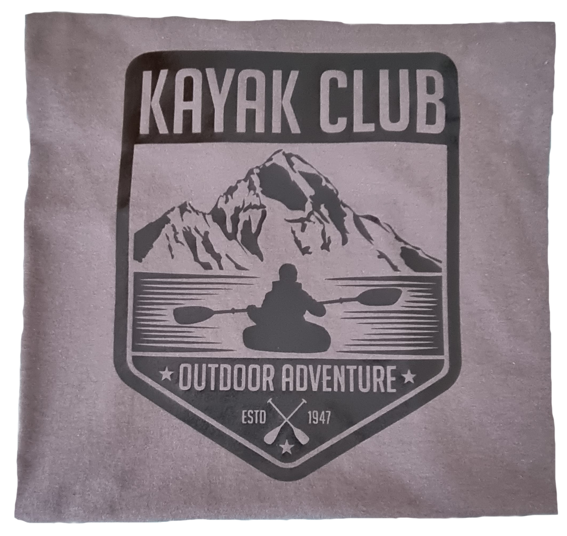 Grey t-shirt with a black graphic of a person kayaking in front of a mountain